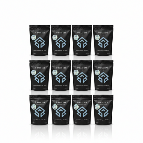 Waxx Inn Curaçao Expert Stripless Hot Wax Beads 1kg box of 12 – 3x4 grid of black pouches with holographic Curaçao label, professional bulk wax supply made in Italy
