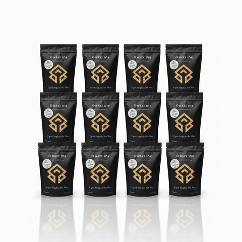Waxx Inn Elixir Expert Stripless Hot Wax Beads 1kg pack of 12 – 4x3 grid of black pouches with Elixir label, bulk professional stripless hard wax supply, made in Italy